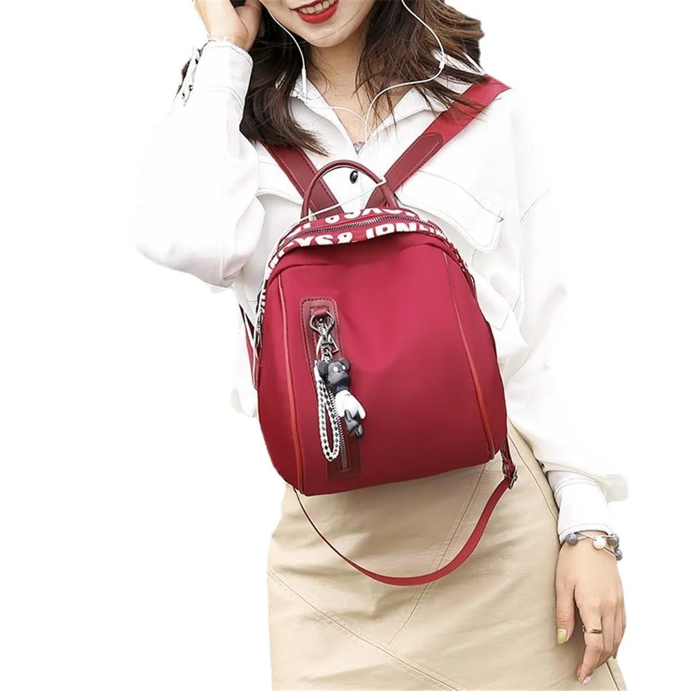 Multifunctional Waterproof Women's Zippered Nylon Backpack With Small Pendant