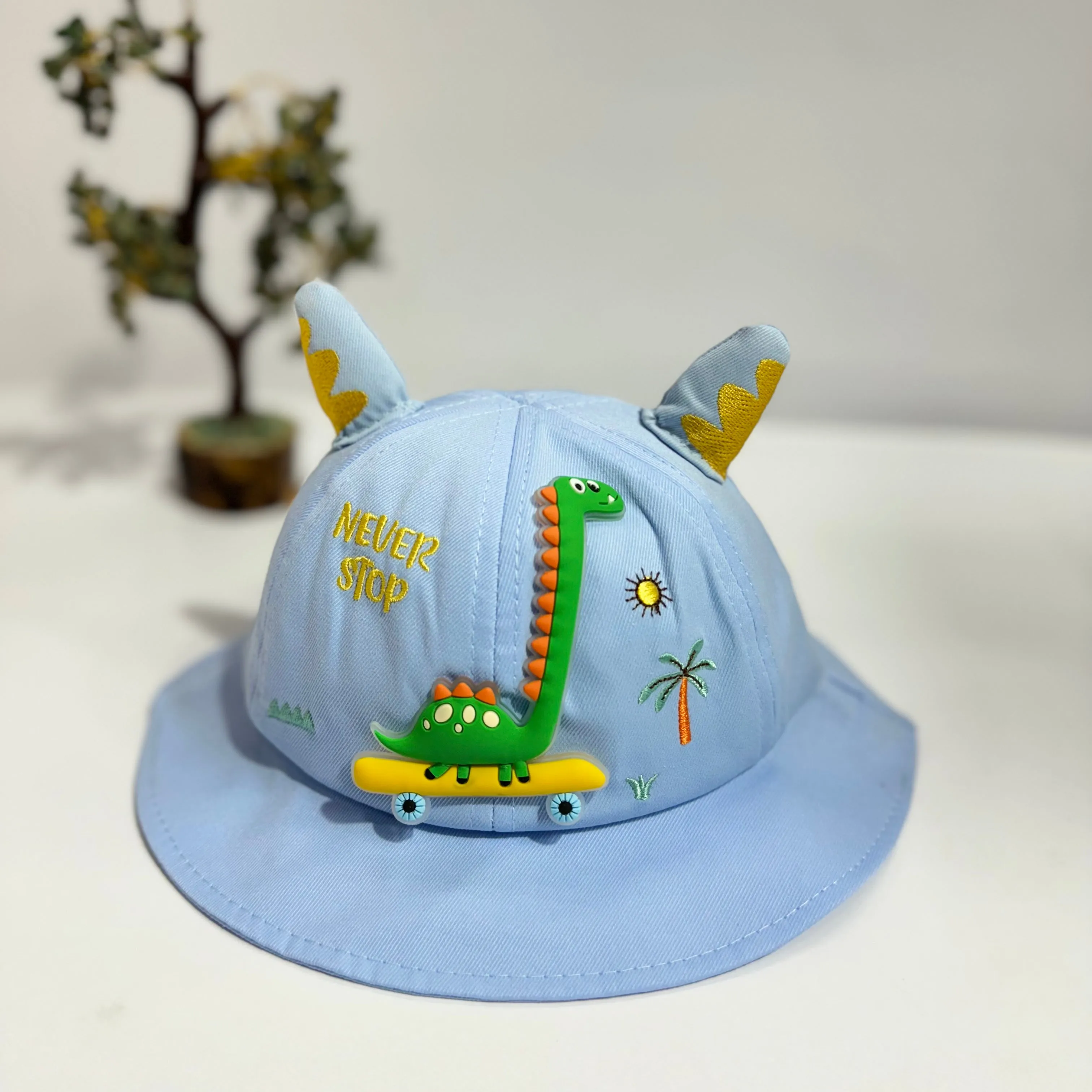 NEVER STOP DINO BUCKET HATS